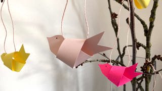 Vögel aus Papier knoten