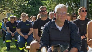 THW-Mitarbeiter Stephan Heinz beim Gedenkgottesdienst in Kröv