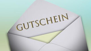 Gutschein in geöffnetem Briefumschlag