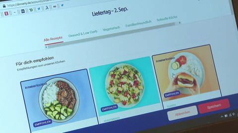 Blick auf Computer-Display: App-Oberfläche mit Auswahl der Tagesgerichte eines Kochboxen-Anbieters