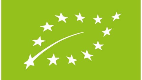 Zu sehen ist das EU-Bio-Siegel. Es ist hellgrün und weiße Sterne formen ein Pflanzenblatt.